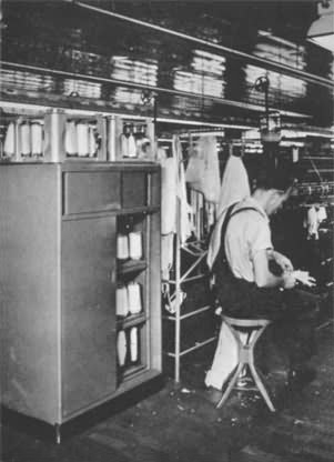 The cabinets in which yarn is stored immediately before placing on the knitting machines